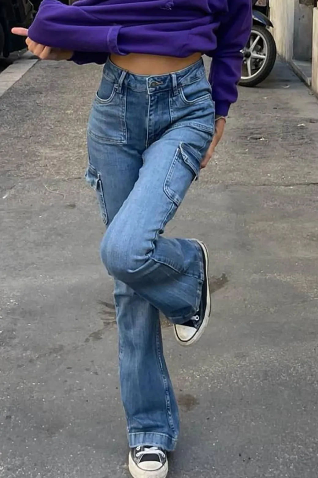 Jeans flare con tasconi