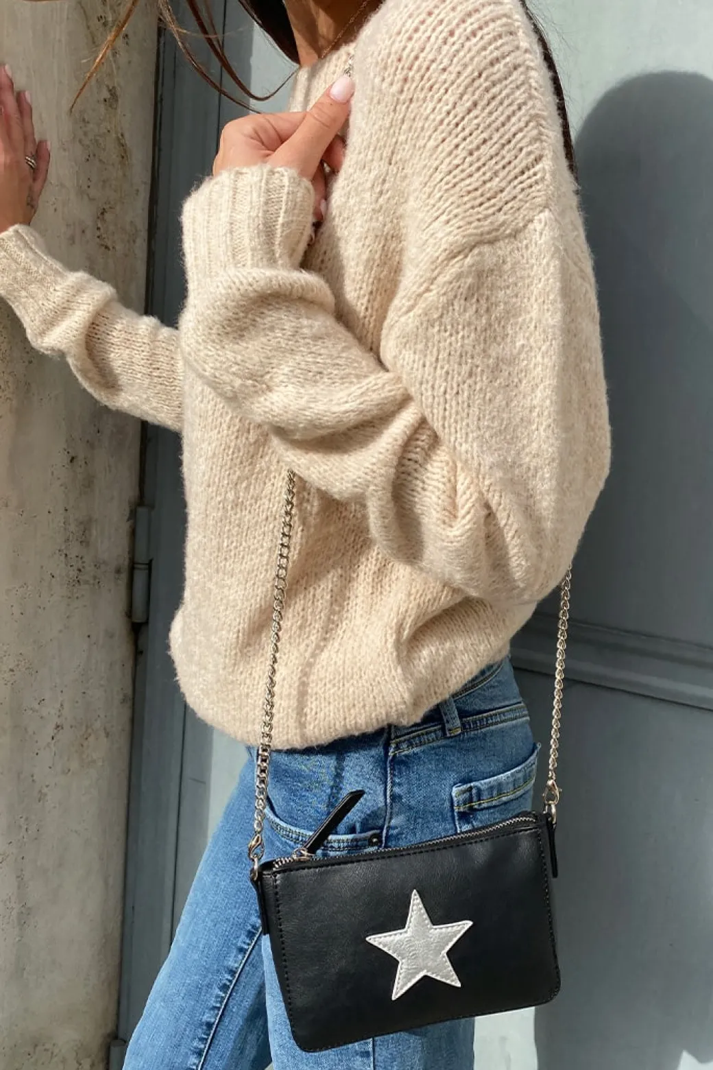 Pochette con stella a tracolla