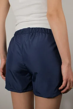 Shorts cucitura laterale