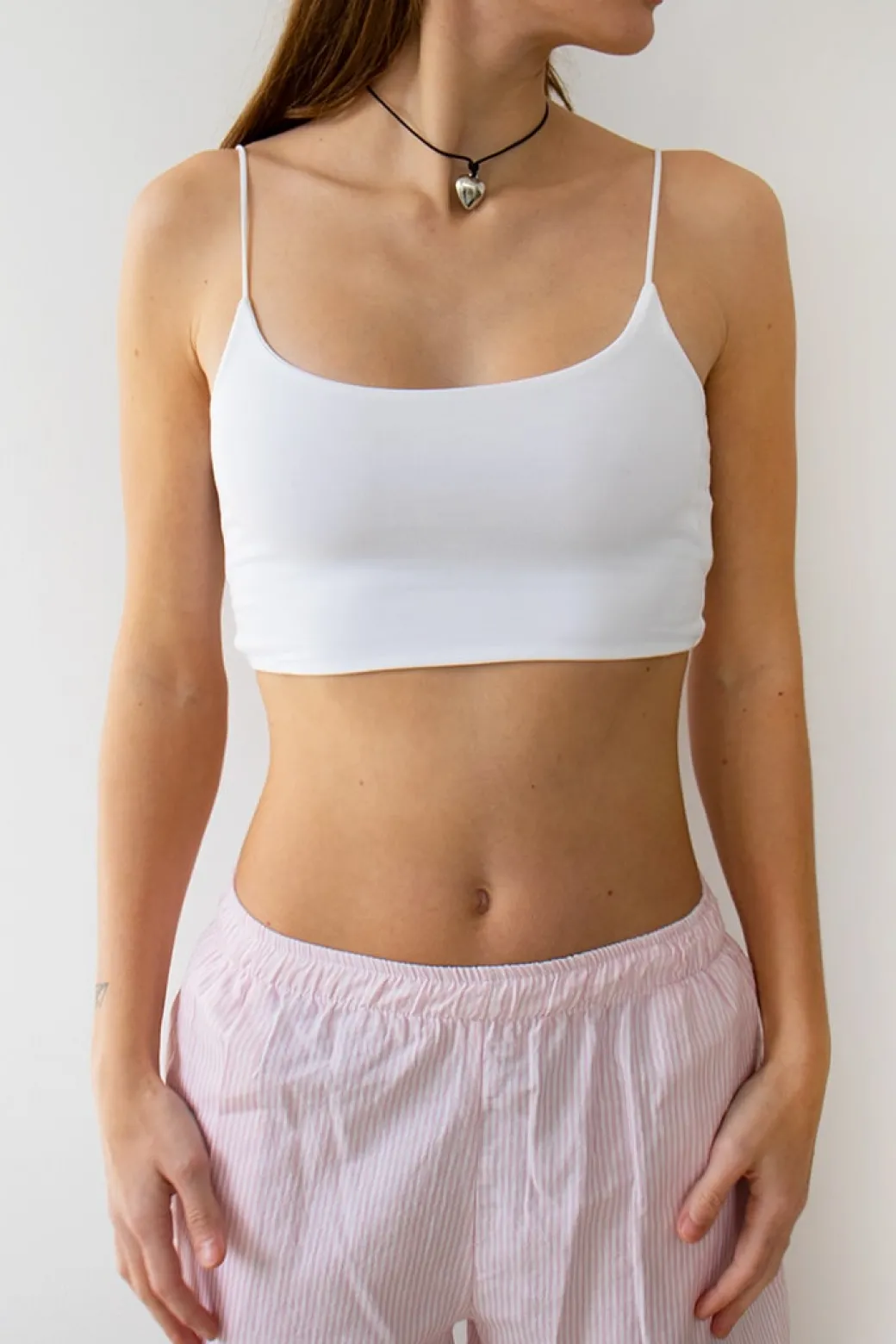 Top crop con bretelline