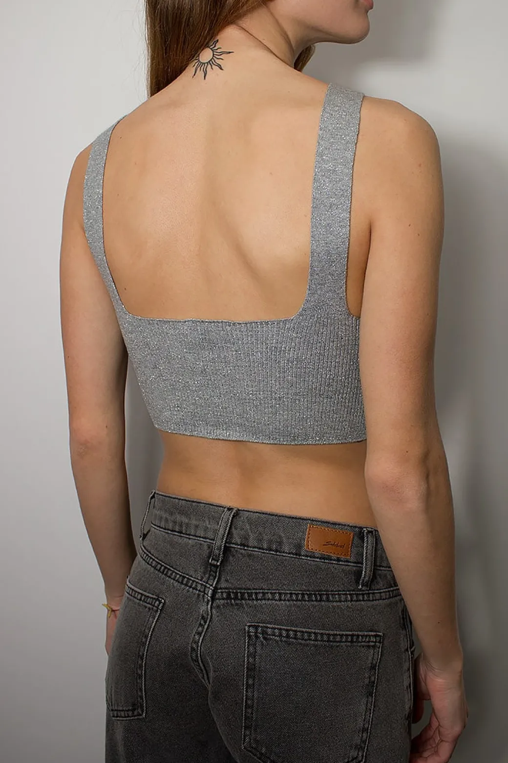 Top scollo sul retro