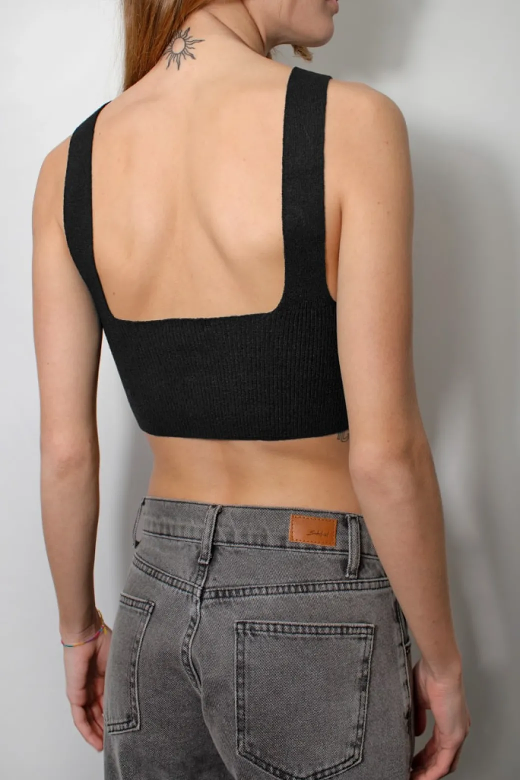 Top scollo sul retro